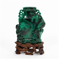 CHINESE, CARVED FIGURAL MALACHITE VASE ON STAND