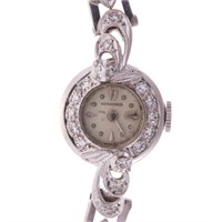 A Lady's Longines Diamond Cocktail Watch in 14K