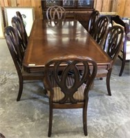 ASHLEY FURNITURE TABLE AND 8 CHAIRS WITH LEAF