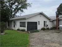3BR 1BA HOME W/LARGE ATTACHED SHOP BLDG ON ½ AC