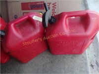 2 - 5 gal plastic gas cans