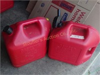 2-5 gal plastic gas cans, one has some fuel
