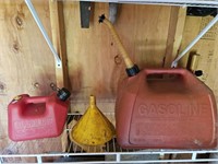 2 gas jugs and a Funnel. 1- 5 gallon gas jug and