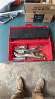 Small toolbox with plier, screwdrivers, and vice