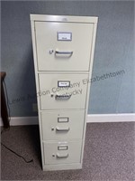 Metal filing cabinet all drawers work and paper