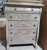 vintage chest of drawers with floral decor