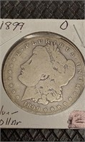 1899 D Morgan silver dollar.