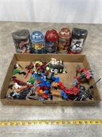 Lego Bionicle toys and empty canisters