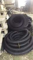 rolls of perferated black tile