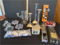 Assorted candles and candle holders