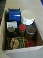 Box of tin cans, mailbox, postal scale