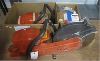 Husqvarna concrete saw with extra parts including