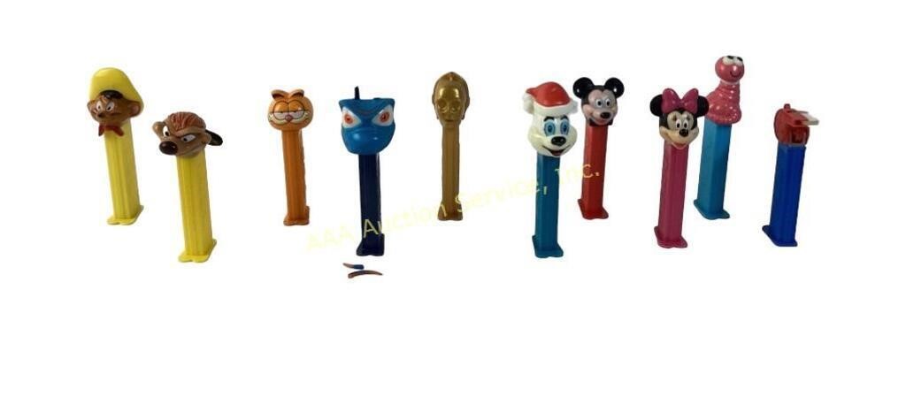 Pez dispensers. Mickey mouse, timone bug,