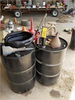 3-55 gallon barrels-1-w/pump, funnels, etc