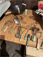 green handled kitchen utensils