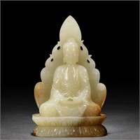 A CHINESE CARVED WHITE JADE SEATED BUDDHA