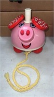 Ohio Art Moveable pink pig toy move along push