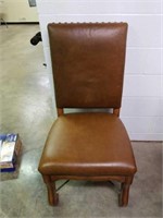 Leather chair. 21x24x43.