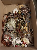 Box of costume jewelry.