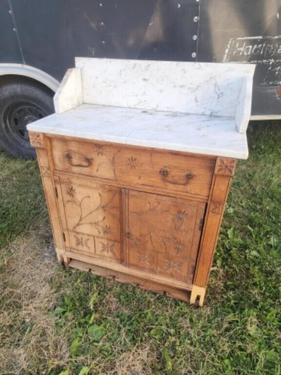 Antique wash stand with marble top rough shape.