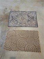 Two Entrance Rugs