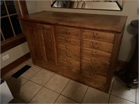 12 drawer walnut cabinet The cabinet is 58 inches