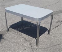 Chrome plated table with Formica top. 48×30.