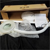New in box Cold Light magnifying lamp.  -M