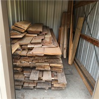 STORAGE UNIT FULL OF HARDWOOD LUMBER