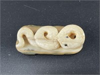 Mammoth ivory netsuke, snake can be strung on a co