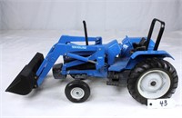 New Holland 8340 Tractor w/7411 FE Loader
