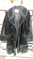 Woman’s unknown size coat
