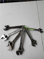 Collection of monkey wrenches.