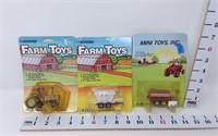 (3) 1/64 Hesston Farm Toys (Tractor, Wagon &