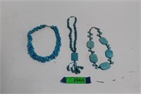 Three Blue Stone Necklaces.