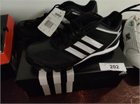 New pair Adidas cleats, size 5