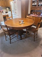 54 in. Round Oak Pedestal Table With Chairs