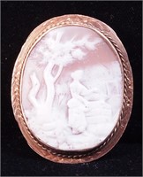 A 2" carved cameo of woman at well under tree