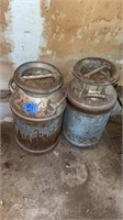 Antique milk cans- one Superior brand and one