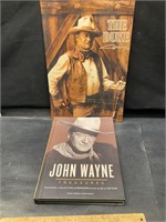 The Duke metal sign and book