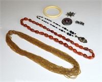 Lot of silver, beaded, and ivory jewellery