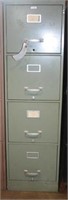 4 drawer filing cabinet, light green in color