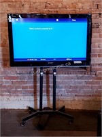 42" SHARP TV ON STAND WITH WHEELS