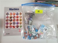BAG OF MARBLES AND BOOK