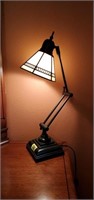 Adjustable table lamp with stained glass shade