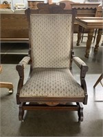 UPHOLSTERED ROCKING CHAIR