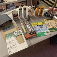 Table Lot- Caulk, Sandpaper, Cleaning Wax