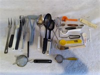 F7)  Multitude of kitchen utensils