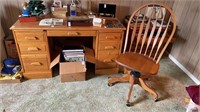 Oak desk with 7 drawers  & swivel rolling chair