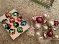 4 Shiny bright ornaments along with additional